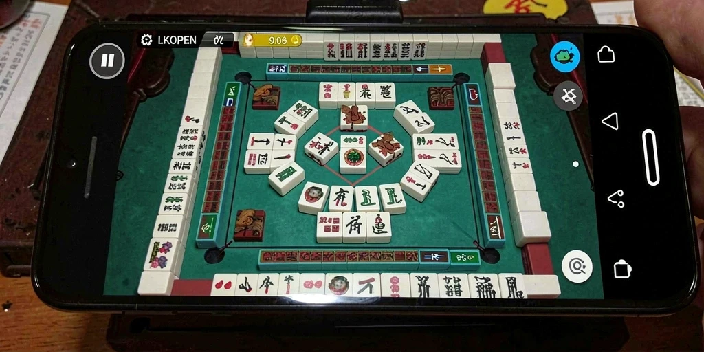 Tampilan gameplay LKOPEN yang menakjubkan dengan desain ubin Mahjong.
